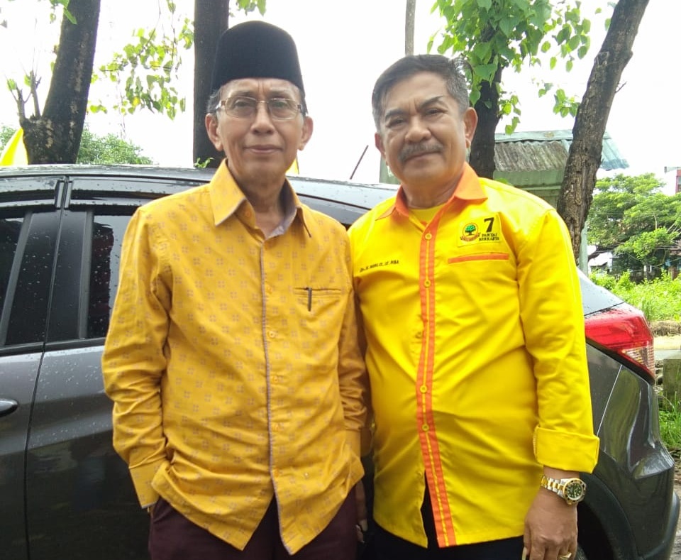 Dari kiri Andi Patabai Pabokori Bersama H. Muhlis, SE,