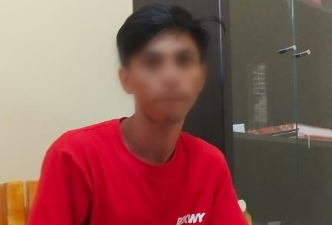 Terduga pelaku Gusriadi alias Adi (24) sesaat setelah diamankan. 