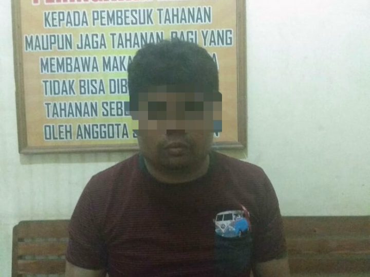 Tersangka J alias Dg. Sewang sesaat setelah diamankan